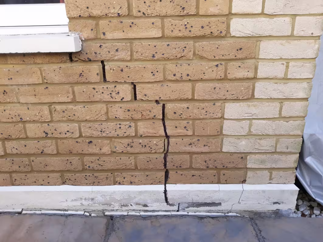 Vertical crack in external brickwork caused by foundation movement