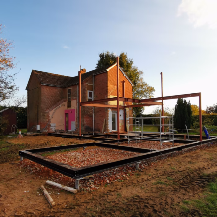 Garden room supported by screw pile foundations